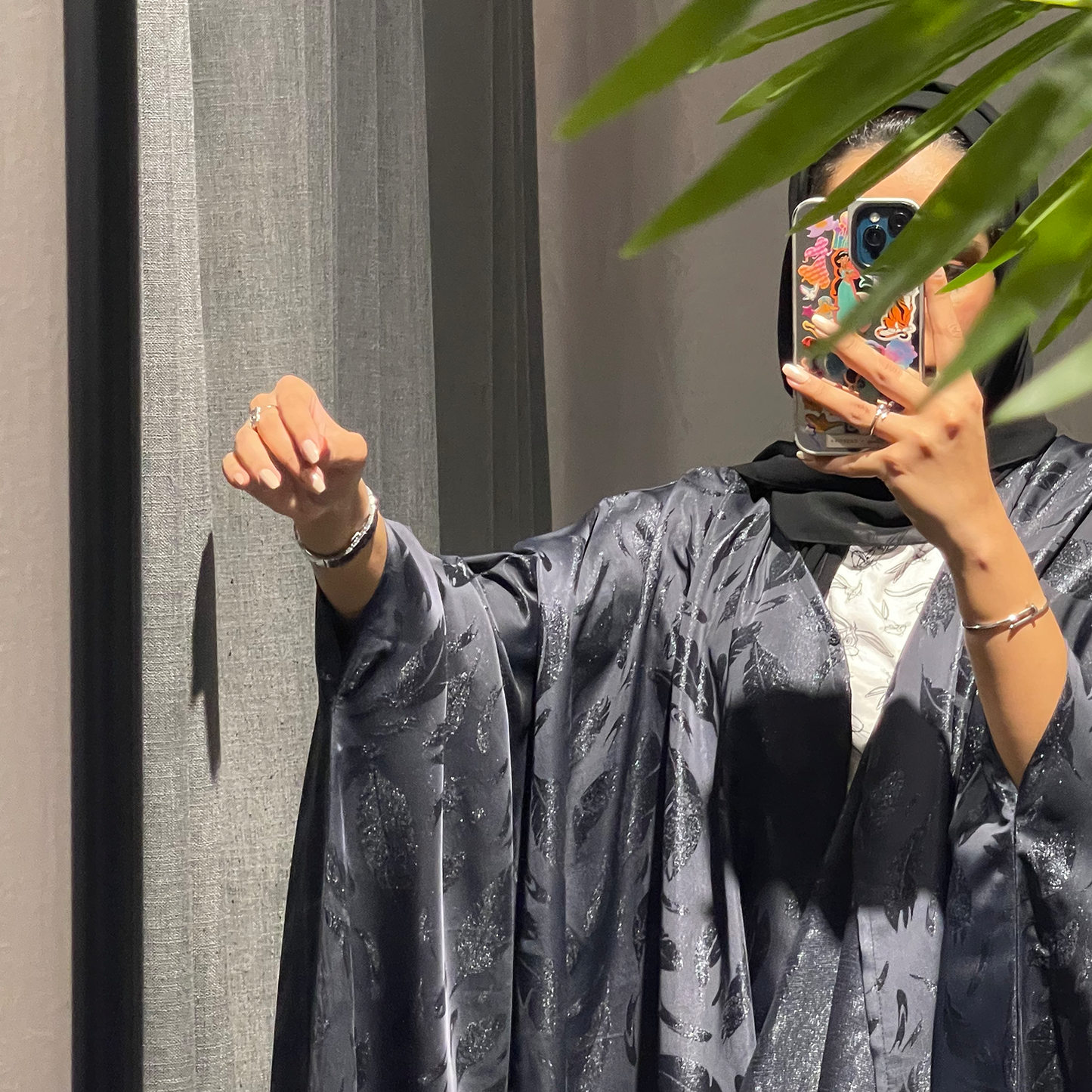 Bahraini with feather fabric