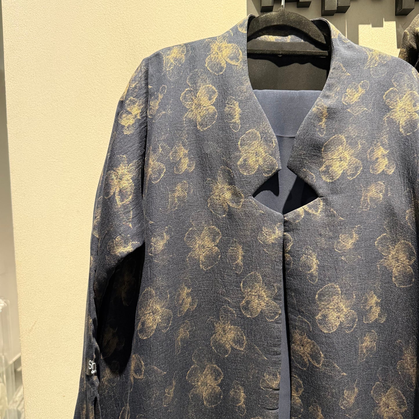 Abaya with blue color and gold flowers