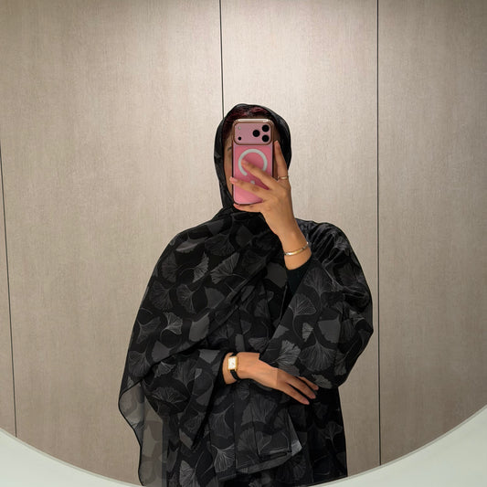 Abaya with black color and silver flowers
