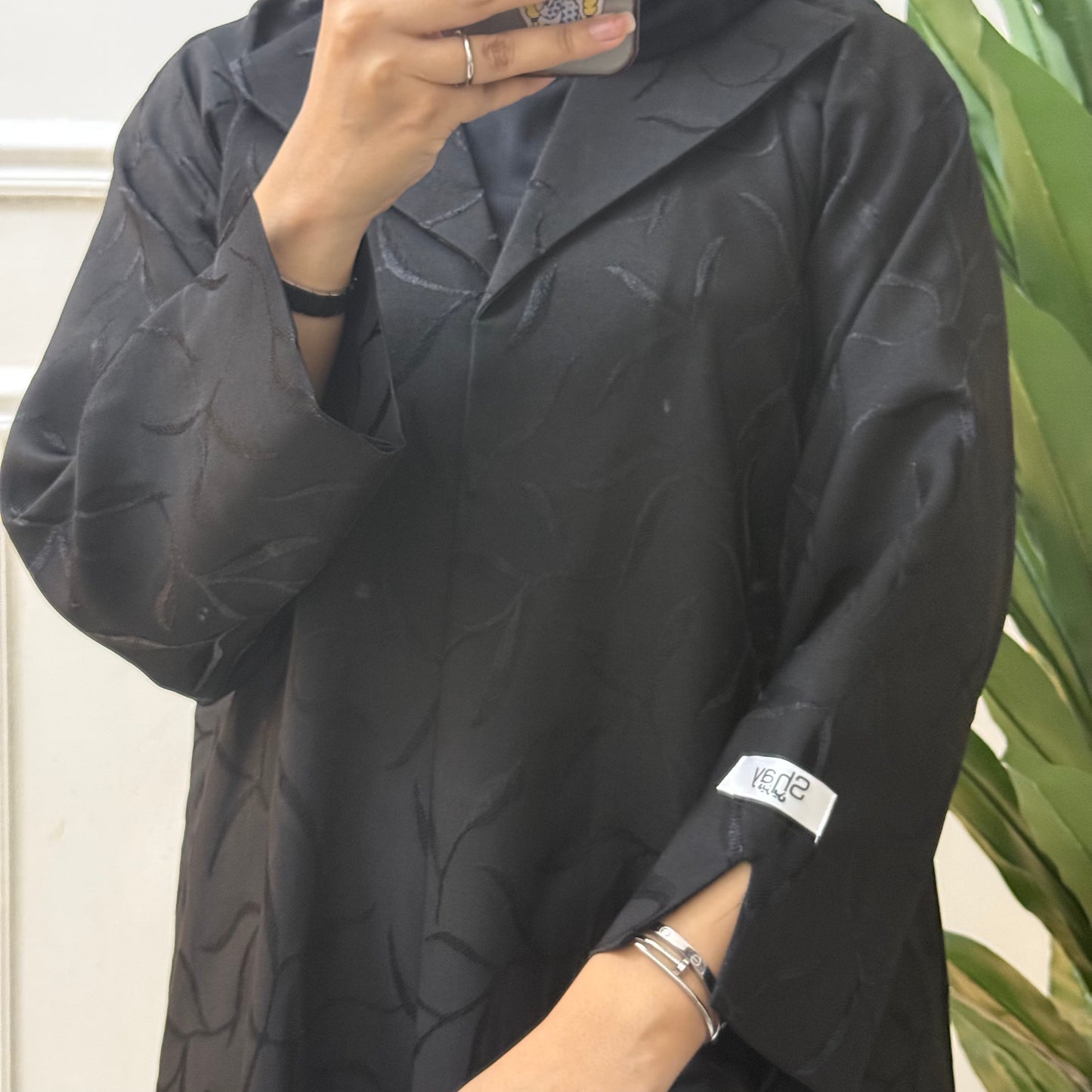 Formal abaya with printed fabric.