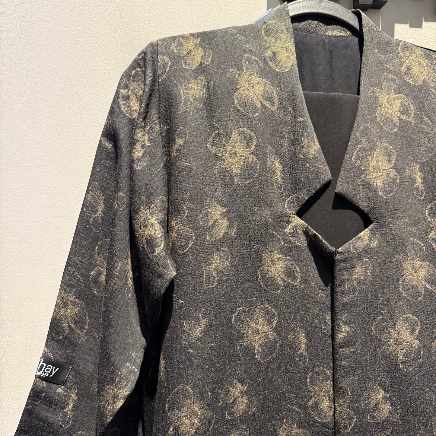 Abaya with black color and gold flowers