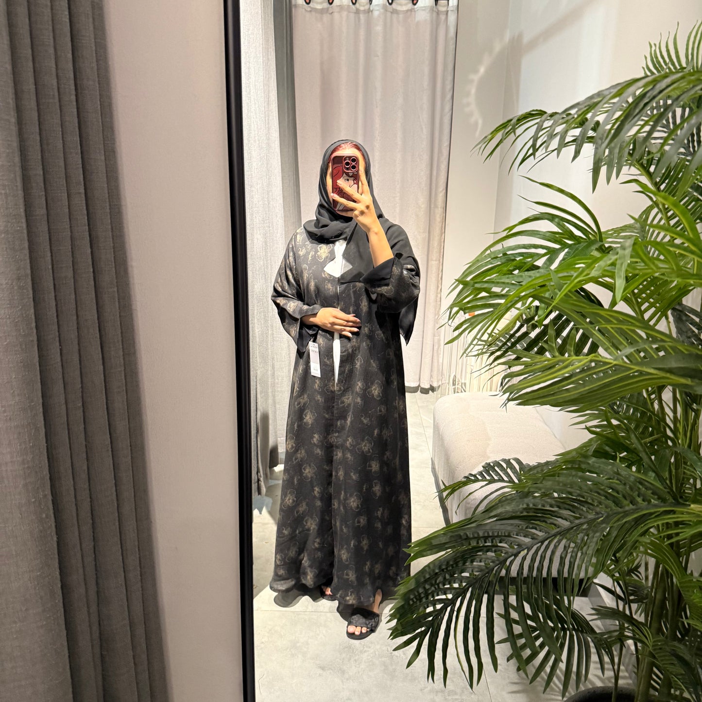 Abaya with black color and gold flowers