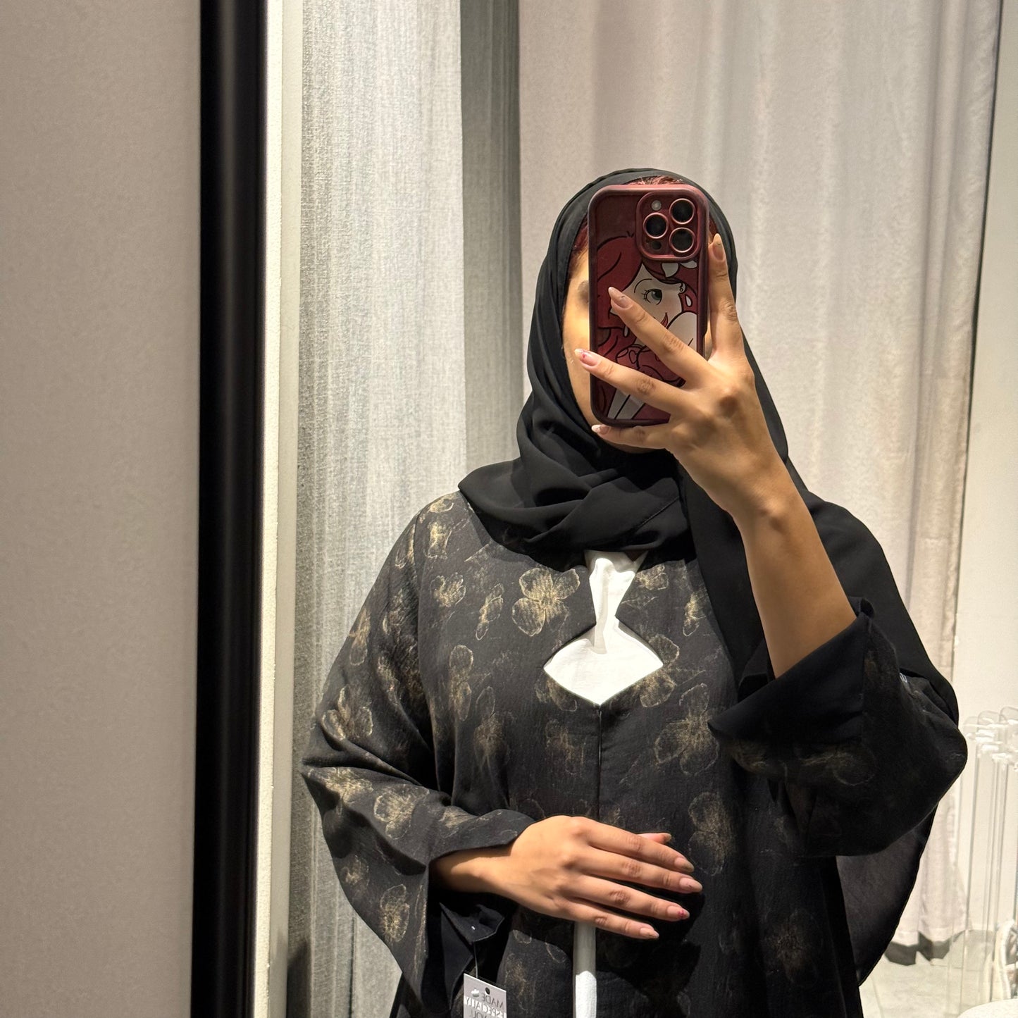 Abaya with black color and gold flowers