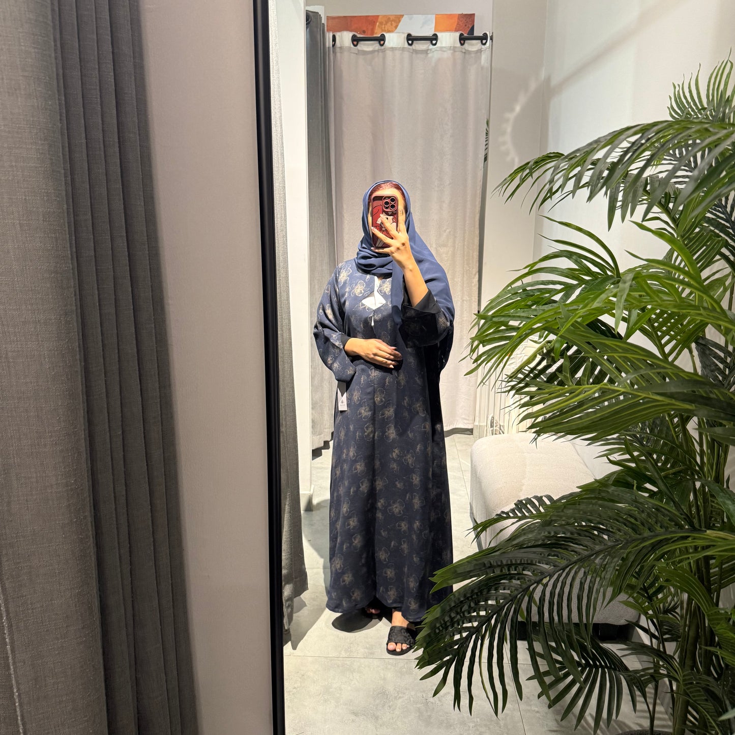 Abaya with blue color and gold flowers