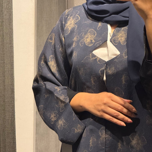 Abaya with blue color and gold flowers