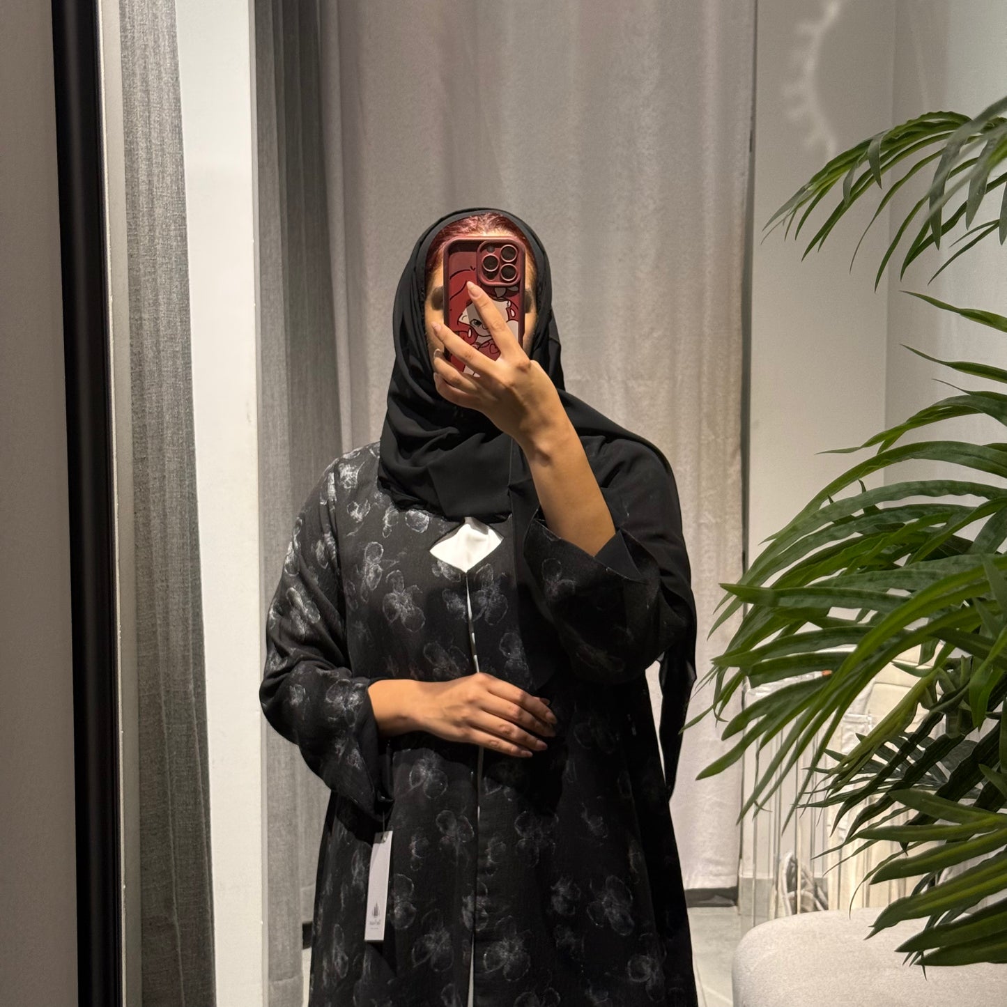 Abaya with black color and silver flowers