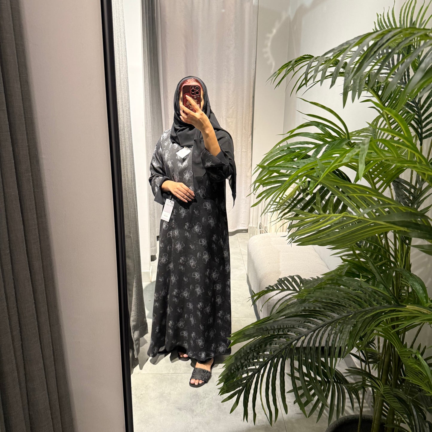 Abaya with black color and silver flowers