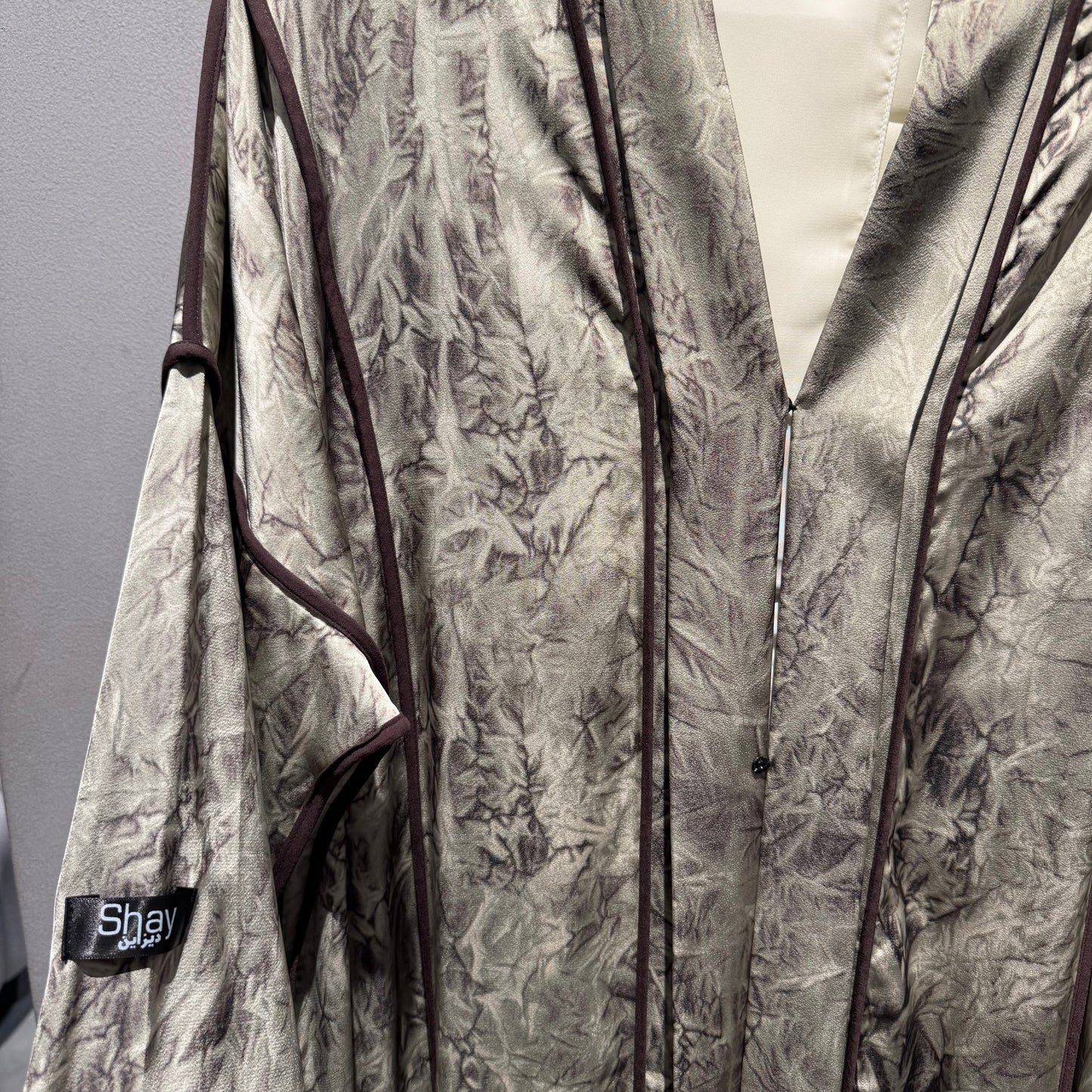 Abaya with beige color and brown lines