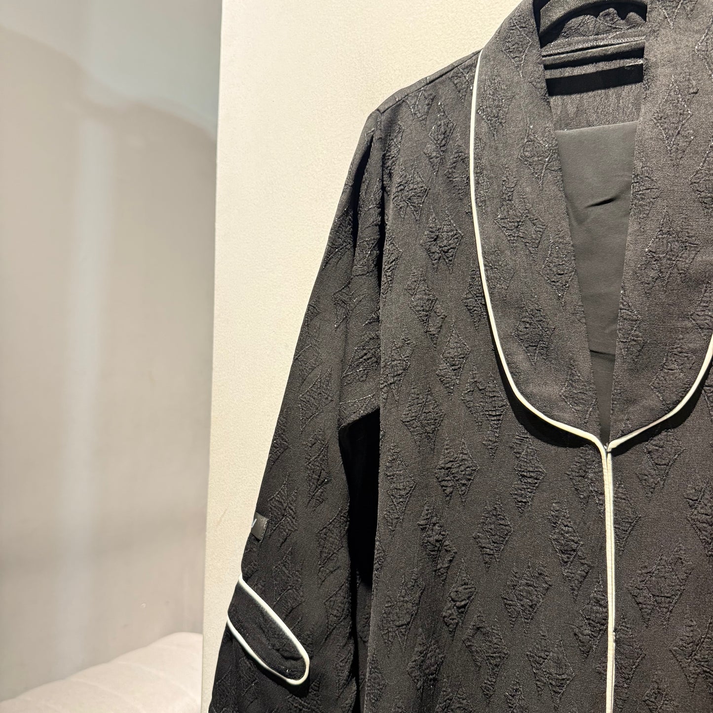 A black printed formal Abaya with white lines