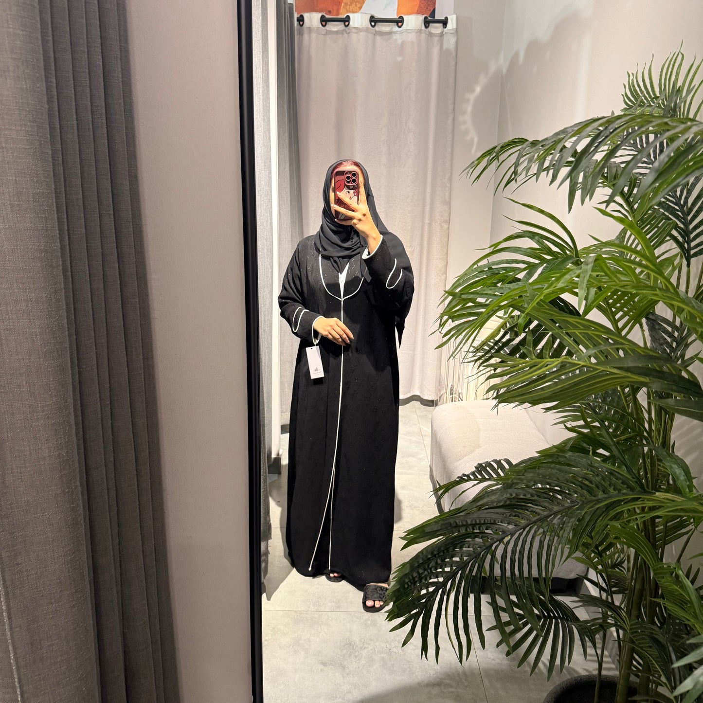 A black printed formal Abaya with white lines