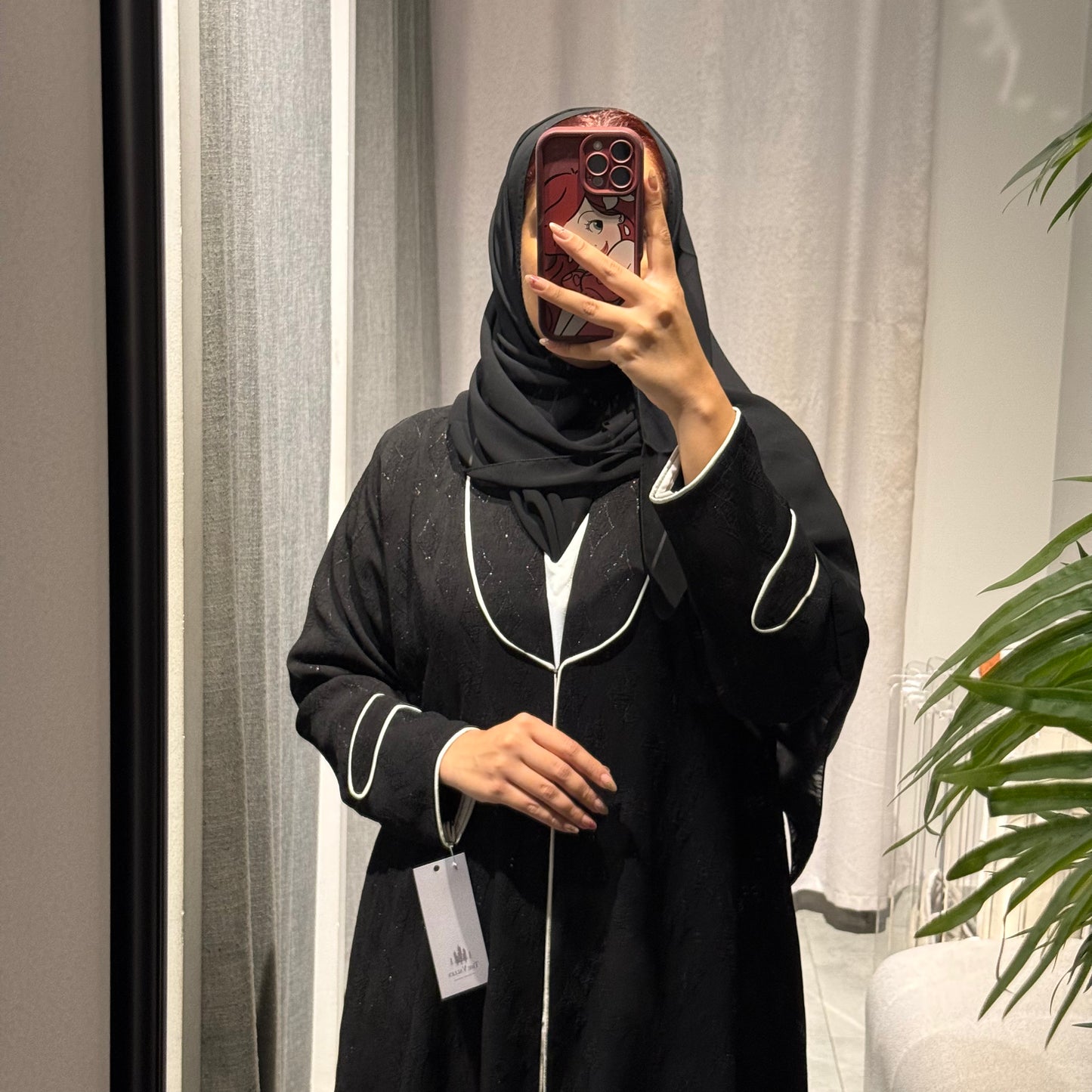 A black printed formal Abaya with white lines
